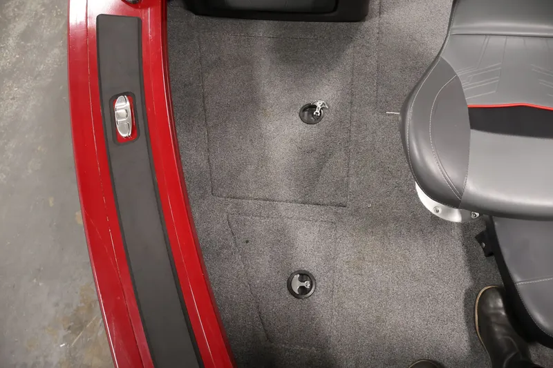 Slide: The Image of Interior of 2022 Tracker Targa V-19 WT boat with gray carpet and seating. - 20