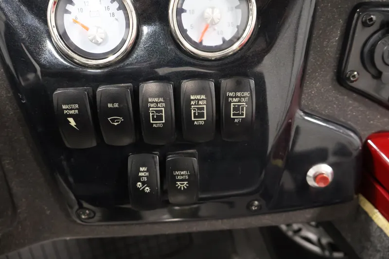 Slide: The Image of Control panel of 2022 Tracker Targa V-19 WT boat with switches and gauges. - 32