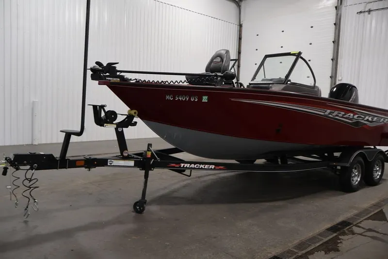 Slide: The Image of 2022 Tracker Targa V-19 WT boat on trailer in indoor storage. - 49
