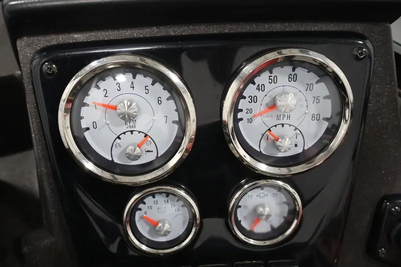 Slide: The Image of Dashboard gauges of 2022 Tracker Targa V-19 WT boat, showing RPM and speed. - 55