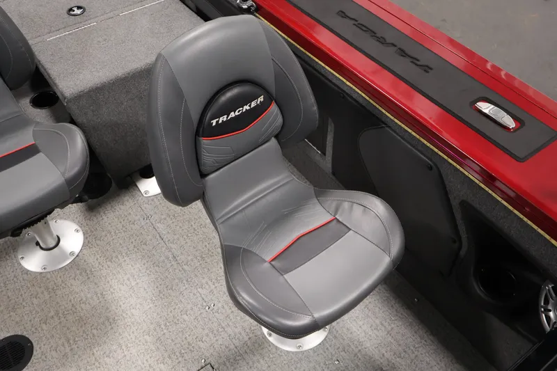Slide: The Image of 2022 Tracker Targa V-19 WT boat interior with gray seating and red accents. - 38