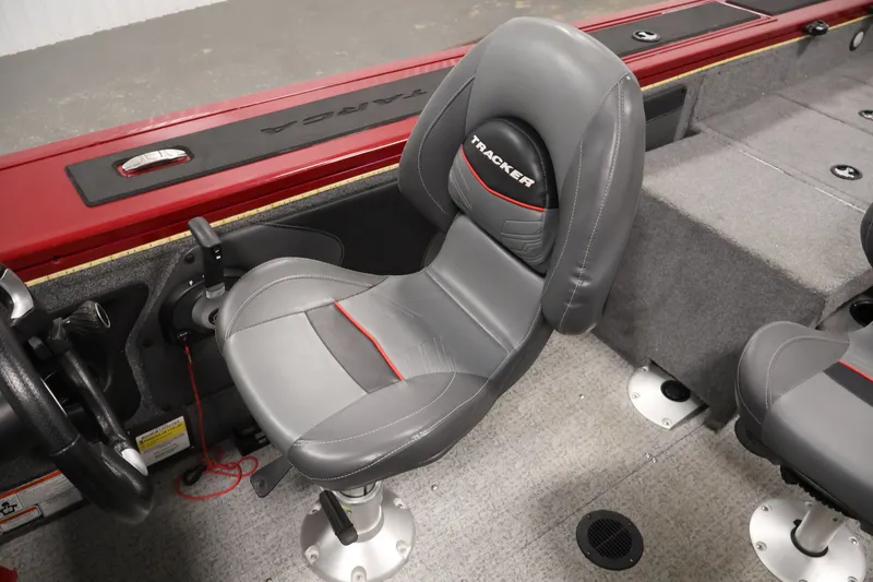Slide: The Image of 2022 Tracker Targa V-19 WT boat interior with gray and red seating. - 35