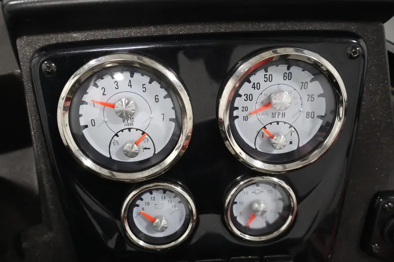 Slide: The Image of Dashboard gauges of 2022 Tracker Targa V-19 WT boat, showing RPM and speed. - 30