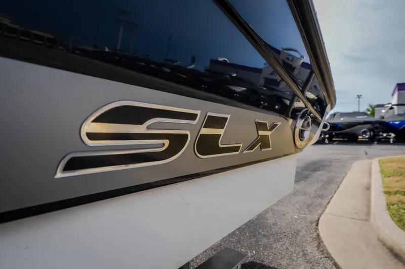 Slide: The Image of Close-up of 2006 Sea Ray 270 SLX boat logo on hull. - 12