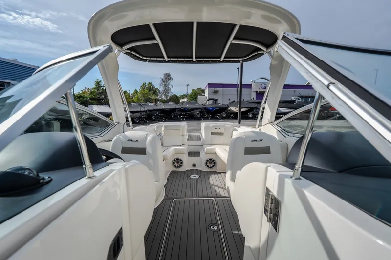 Slide: The Image of 2006 Sea Ray 270 SLX boat interior with sleek seating and modern design. - 34