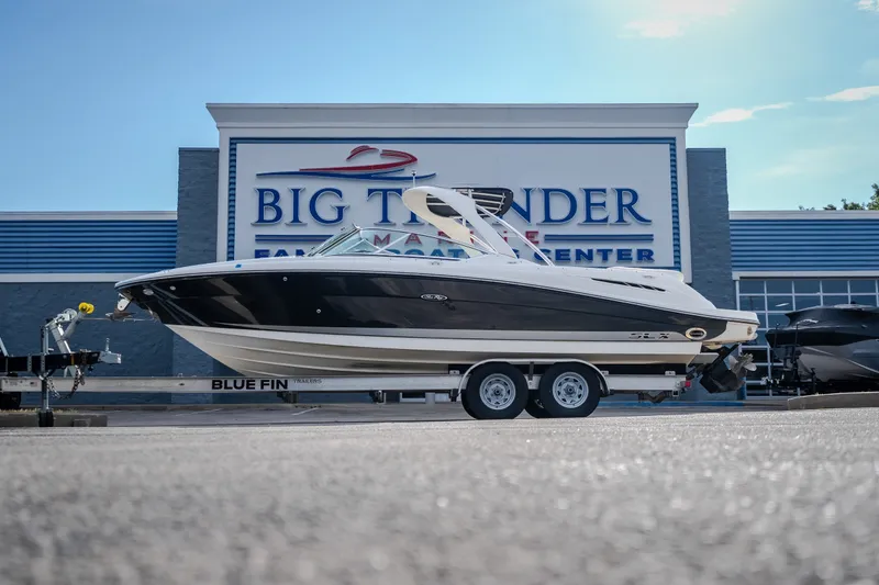 The Image of 2006 Sea Ray 270 SLX boat on trailer at Big Thunder Marine Center. - 0