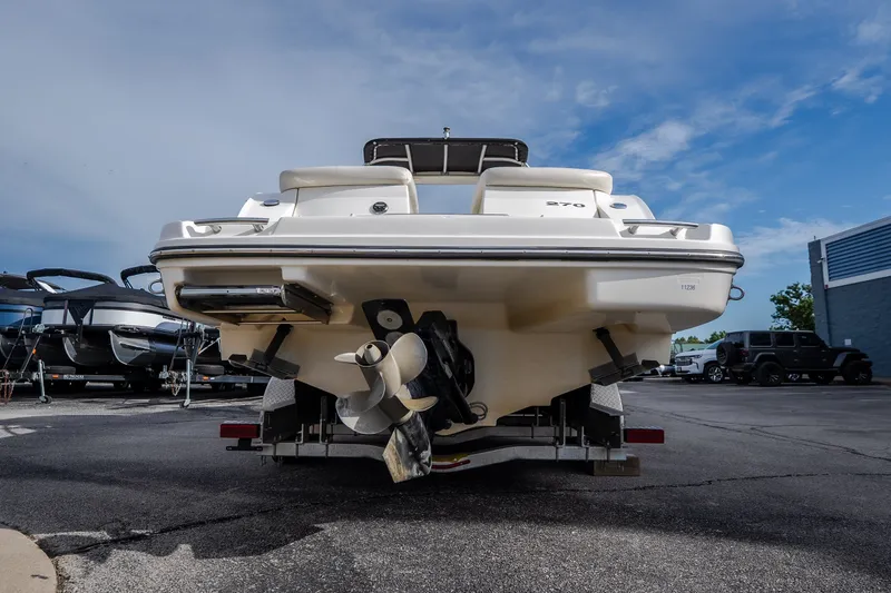 Slide: The Image of Rear view of a 2006 Sea Ray 270 SLX boat on a trailer. - 10