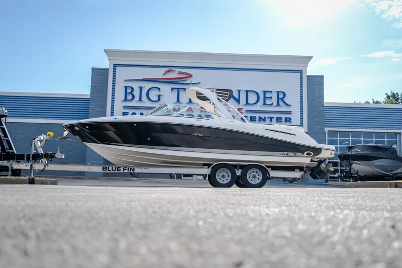 Slide: The Image of 2006 Sea Ray 270 SLX boat on trailer at Big Thunder Marine dealership. - 49