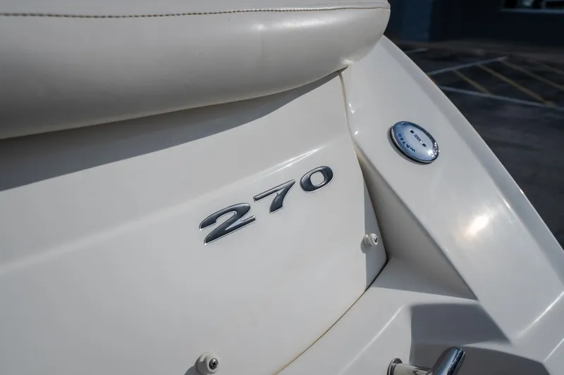 Slide: The Image of Close-up of 2006 Sea Ray 270 SLX boat emblem and seating detail. - 46