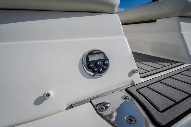 Slide: The Image of 2006 Sea Ray 270 SLX boat control panel and deck detail. - 45
