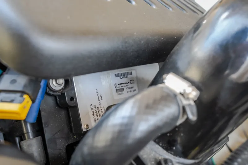 Slide: The Image of Engine component of a 2006 Sea Ray 270 SLX boat, featuring a Motorola ETC module. - 44