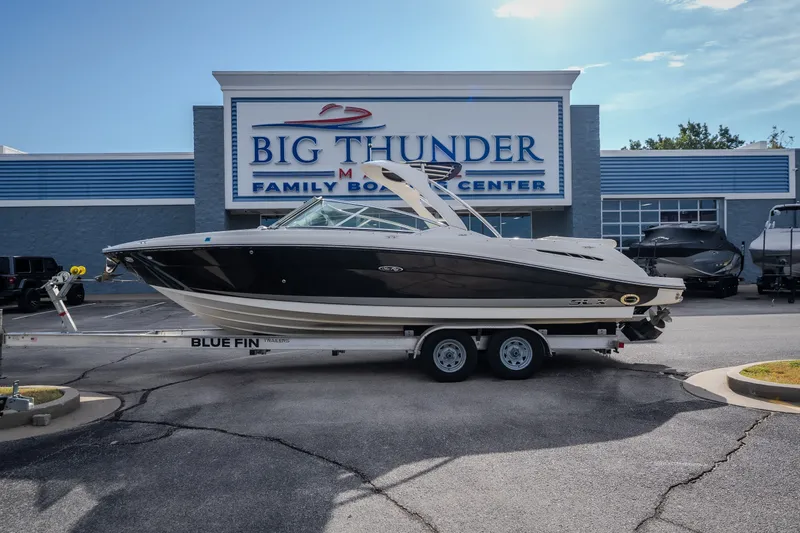 Slide: The Image of 2006 Sea Ray 270 SLX boat on trailer at Big Thunder Marine dealership. - 50