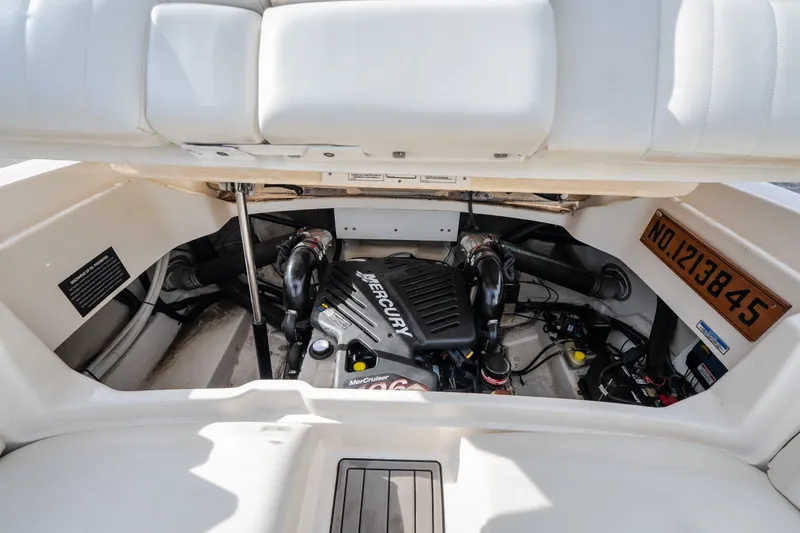 Slide: The Image of Engine compartment of a 2006 Sea Ray 270 SLX boat with MerCruiser engine. - 42