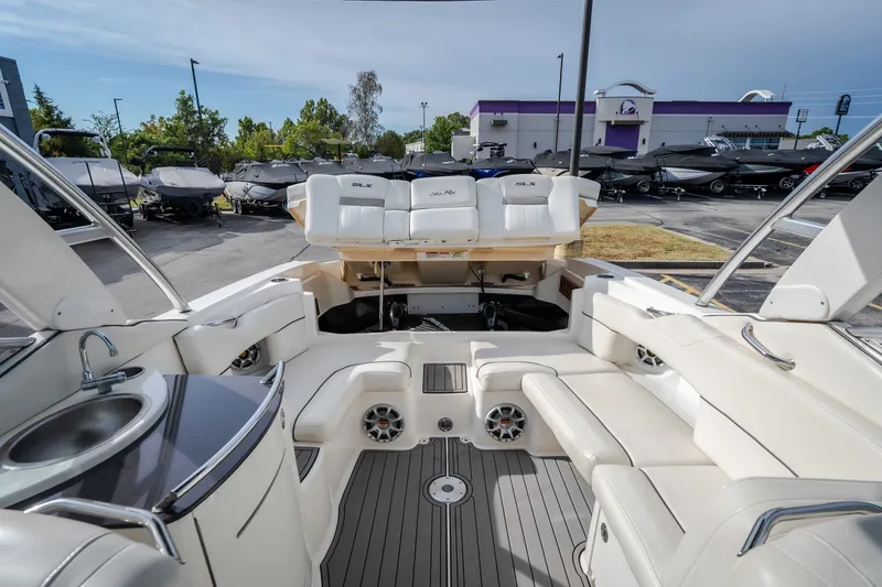 Slide: The Image of 2006 Sea Ray 270 SLX boat interior with luxurious seating and built-in sink. - 41