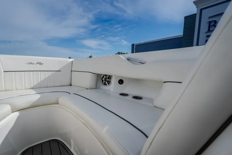 Slide: The Image of Luxurious white seating on 2006 Sea Ray 270 SLX boat under blue sky. - 30