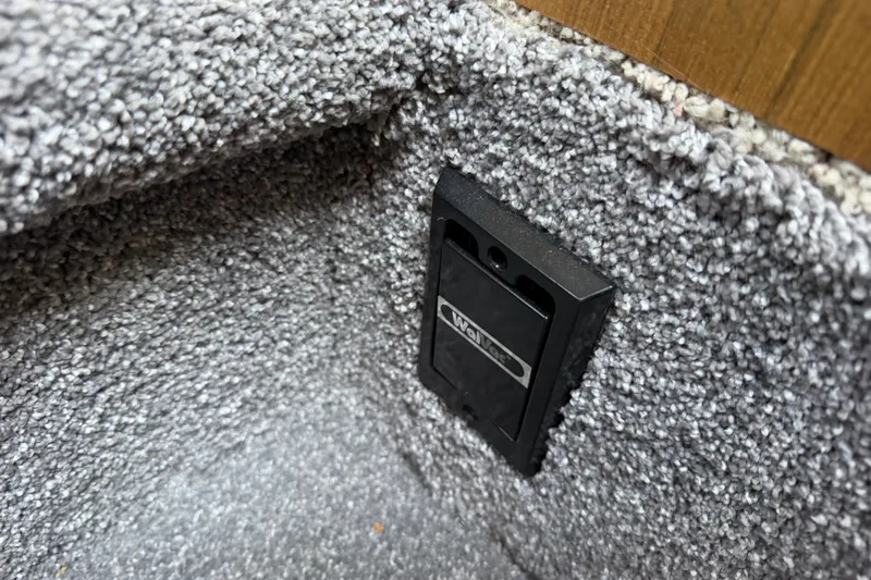 Slide: The Image of Carpeted interior of 2001 Bayliner 3788 Motoryacht with wall-mounted outlet. - 63