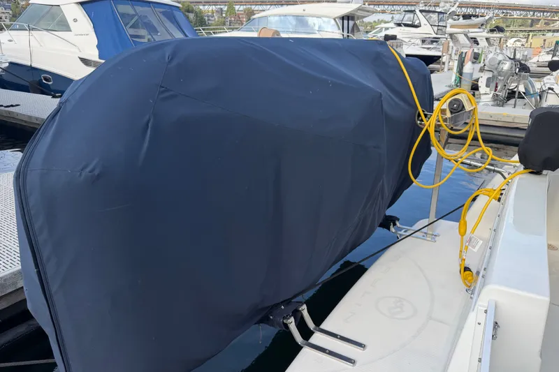 Slide: The Image of Covered boat equipment on a 2001 Bayliner 3788 Command Bridge Motoryacht at a marina. - 65