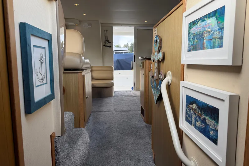 Slide: The Image of Interior of 2001 Bayliner 3788 Command Bridge Motoryacht with nautical decor and artwork. - 42