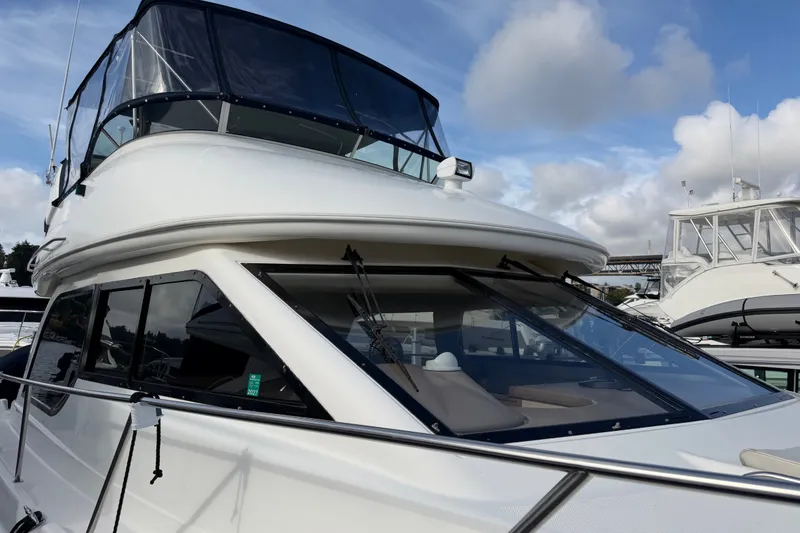 Slide: The Image of 2001 Bayliner 3788 Command Bridge Motoryacht with sleek design and spacious upper deck. - 70