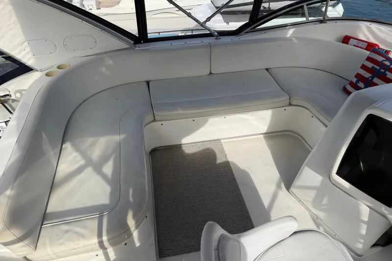 Slide: The Image of Spacious seating area on 2001 Bayliner 3788 Command Bridge Motoryacht with cushioned seats. - 49