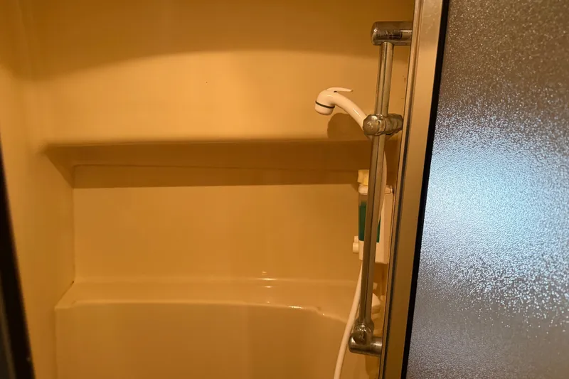 Slide: The Image of Shower area in 2001 Bayliner 3788 Command Bridge Motoryacht with sliding door. - 34