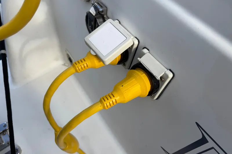 Slide: The Image of Yellow power cables connected to a 2001 Bayliner 3788 Command Bridge Motoryacht. - 68