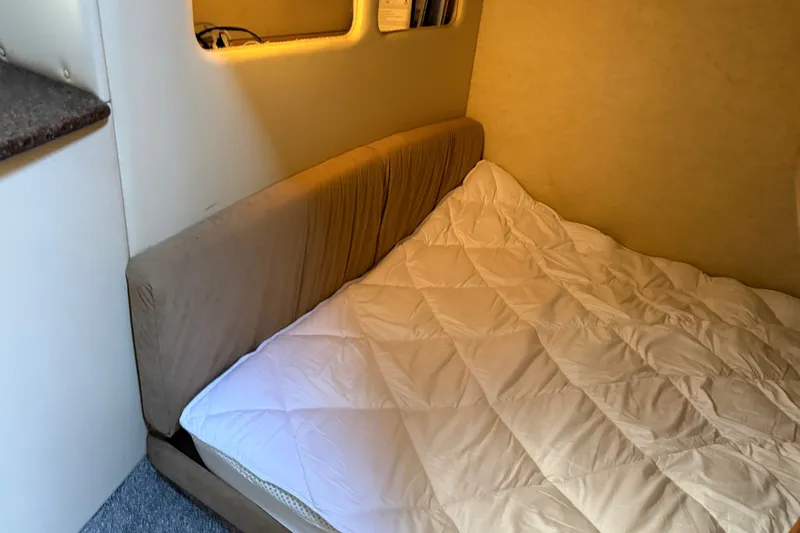 Slide: The Image of Cozy cabin bed in 2001 Bayliner 3788 Command Bridge Motoryacht interior. - 38
