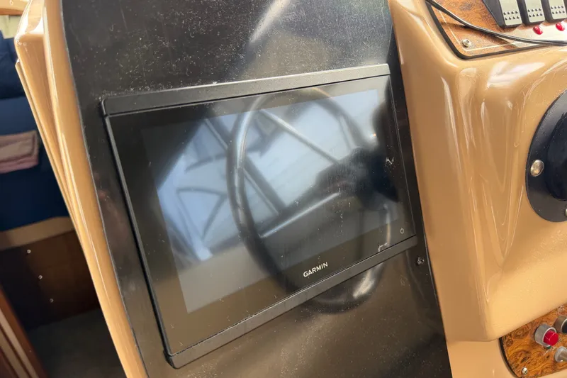 Slide: The Image of Garmin display on 2001 Bayliner 3788 Command Bridge Motoryacht dashboard. - 21