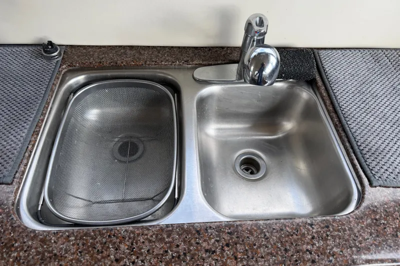 Slide: The Image of Stainless steel sink with faucet on 2001 Bayliner 3788 Command Bridge Motoryacht. - 17
