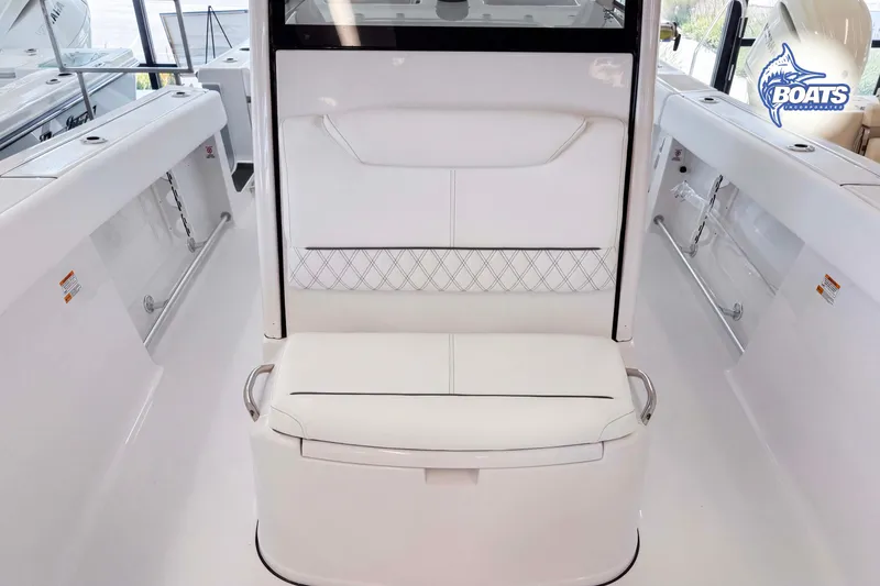 Slide: The Image of 2027 Sportsman Heritage 261 Center Console interior with white seating and modern design. - 4