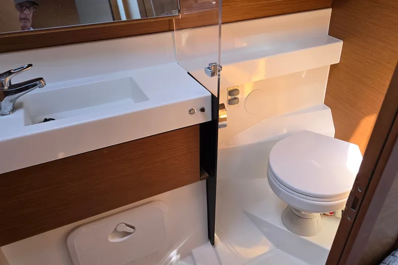Slide: The Image of Modern bathroom in 2020 Jeanneau Sun Odyssey 410 yacht with sink and toilet. - 52