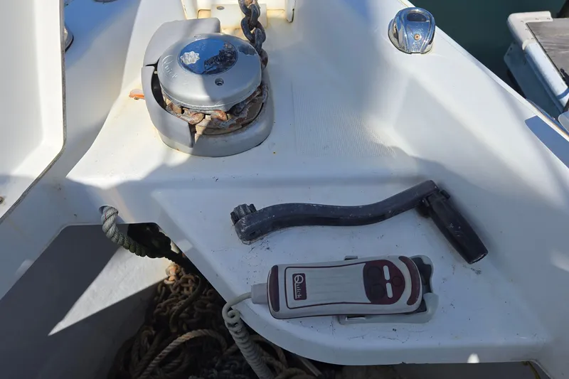 Slide: The Image of Jeanneau Sun Odyssey 410 deck with winch handle and control panel, 2020 model. - 21