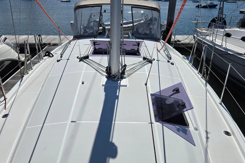 Slide: The Image of Jeanneau Sun Odyssey 410 sailboat deck, 2020 model, docked at marina. - 23