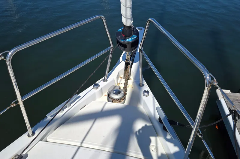 Slide: The Image of Bow of 2020 Jeanneau Sun Odyssey 410 sailboat with anchor and railing. - 19