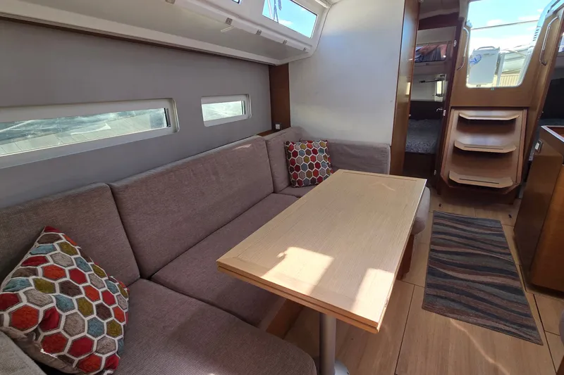 Slide: The Image of Interior of 2020 Jeanneau Sun Odyssey 410 yacht with cozy seating and modern design. - 41