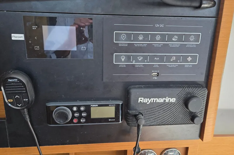 Slide: The Image of Control panel of a 2020 Jeanneau Sun Odyssey 410 sailboat with Raymarine equipment. - 55
