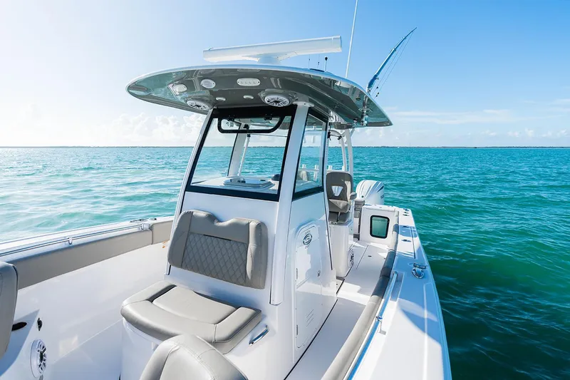 Slide: The Image of Manufacturer Provided Image: 2025 Sportsman Open 282 Center Console boat on clear blue ocean. - 6
