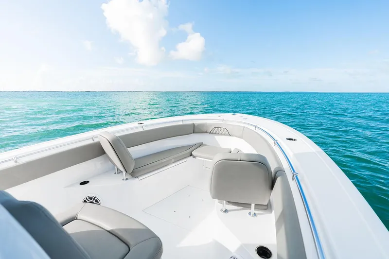 Slide: The Image of Manufacturer Provided Image: 2025 Sportsman Open 282 Center Console boat on clear blue ocean. - 4