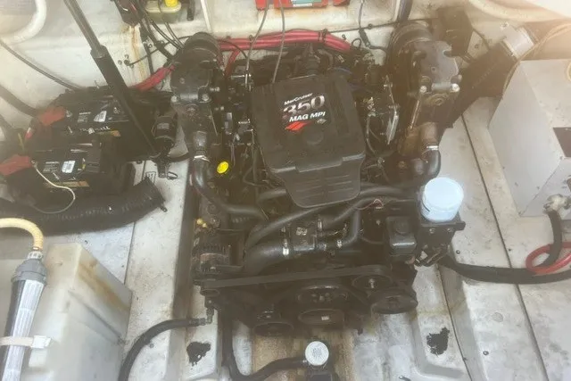 Slide: The Image of Engine compartment of a 2008 Sea Ray 220 Sundancer boat. - 28