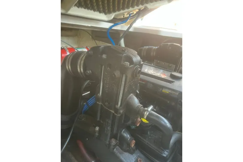 Slide: The Image of Engine compartment of a 2008 Sea Ray 220 Sundancer boat. - 29