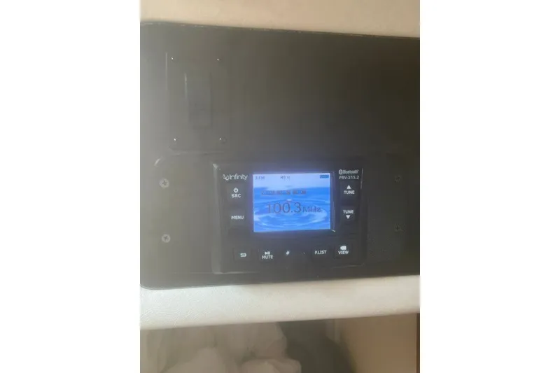 Slide: The Image of Infinity stereo system on 2008 Sea Ray 220 Sundancer boat dashboard. - 14