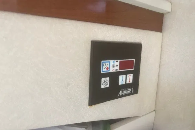 Slide: The Image of Control panel on 2008 Sea Ray 220 Sundancer boat interior wall. - 25