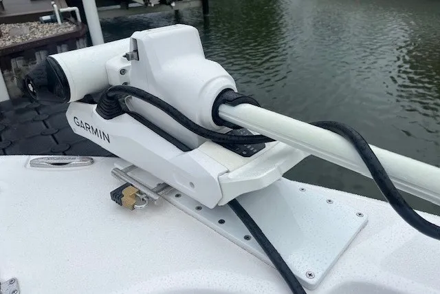Slide: The Image of Garmin marine equipment on 2023 Sea Fox 248 Commander boat, docked by water. - 30