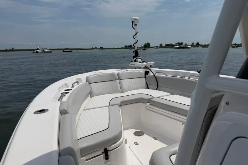 Slide: The Image of 2023 Sea Fox 248 Commander boat with spacious seating on calm waters. - 21