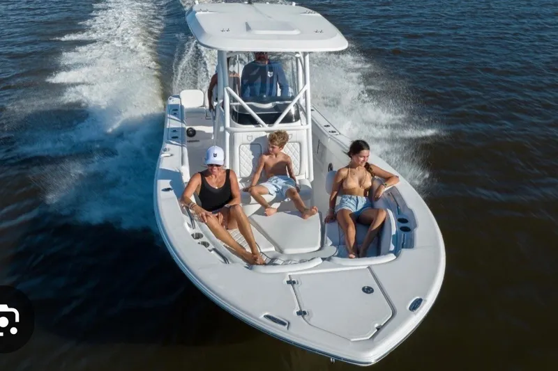 Slide: The Image of 2023 Sea Fox 248 Commander cruising with passengers on a sunny day. - 1