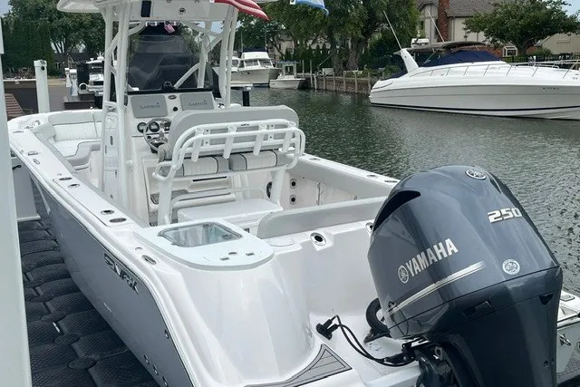 Slide: The Image of 2023 Sea Fox 248 Commander boat with Yamaha 250 engine docked in marina. - 5