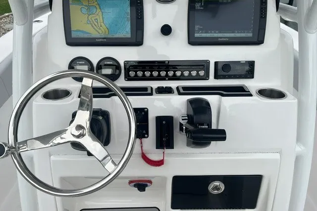 Slide: The Image of Center console of 2023 Sea Fox 248 Commander with navigation screens and controls. - 10