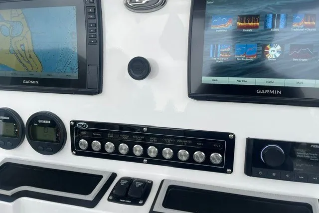 Slide: The Image of Control panel of 2023 Sea Fox 248 Commander with Garmin displays and Yamaha gauges. - 11