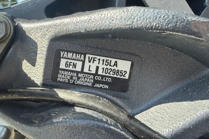 Slide: The Image of Yamaha VF115LA engine label on 2022 Hewes Redfisher 16 boat, made in Japan. - 61
