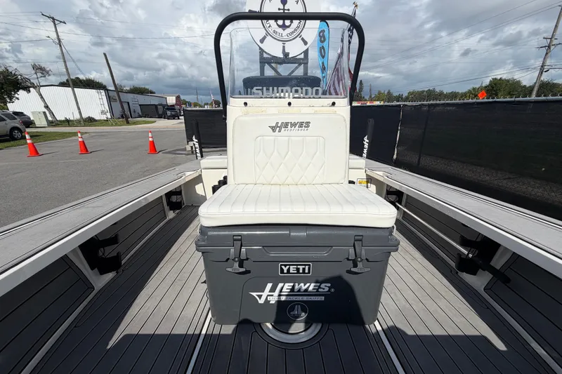 Slide: The Image of 2022 Hewes Redfisher 16 boat interior with Yeti cooler and seating. - 38